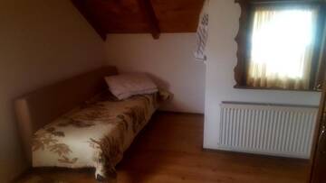 Фото номера Дом с 2 спальнями Загородные дома Cabana Rustic г. Борша 9
